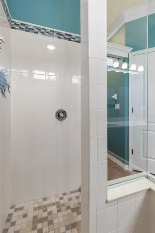 an aerial view of a house with a lake view