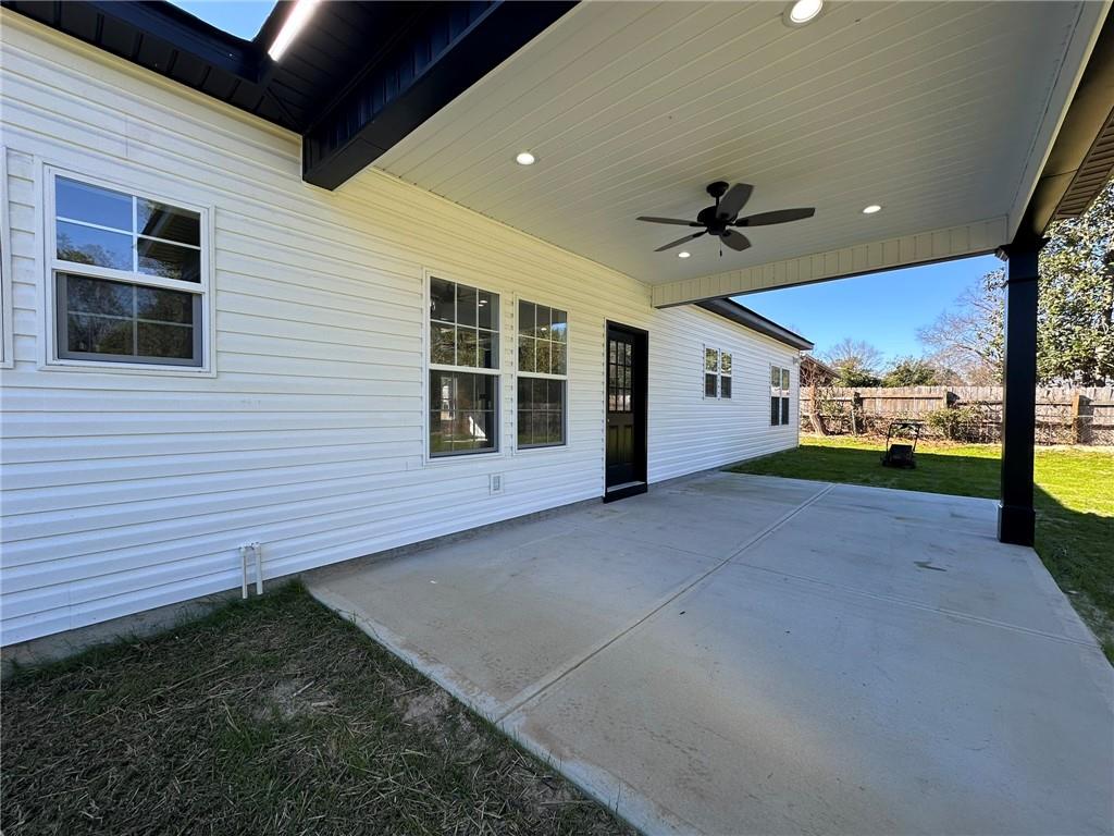 2513 Weldon Drive Augusta, GA 30906 - Photo 12 of 33 a view of a porch with a table and chairs