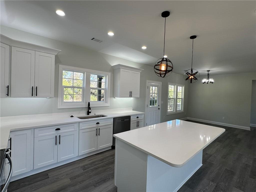 2513 Weldon Drive Augusta, GA 30906 - Photo 19 of 33 a kitchen with a white center island and cabinets