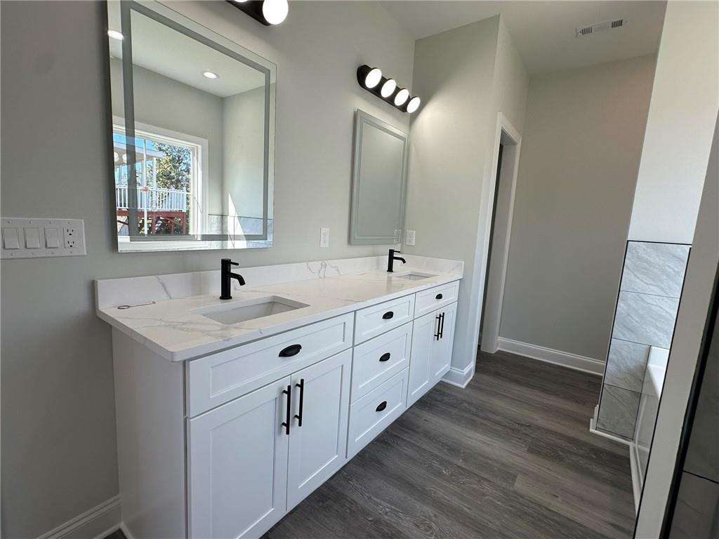 2513 Weldon Drive Augusta, GA 30906 - Photo 27 of 33 a bathroom with double vanity sink a vanity and mirror