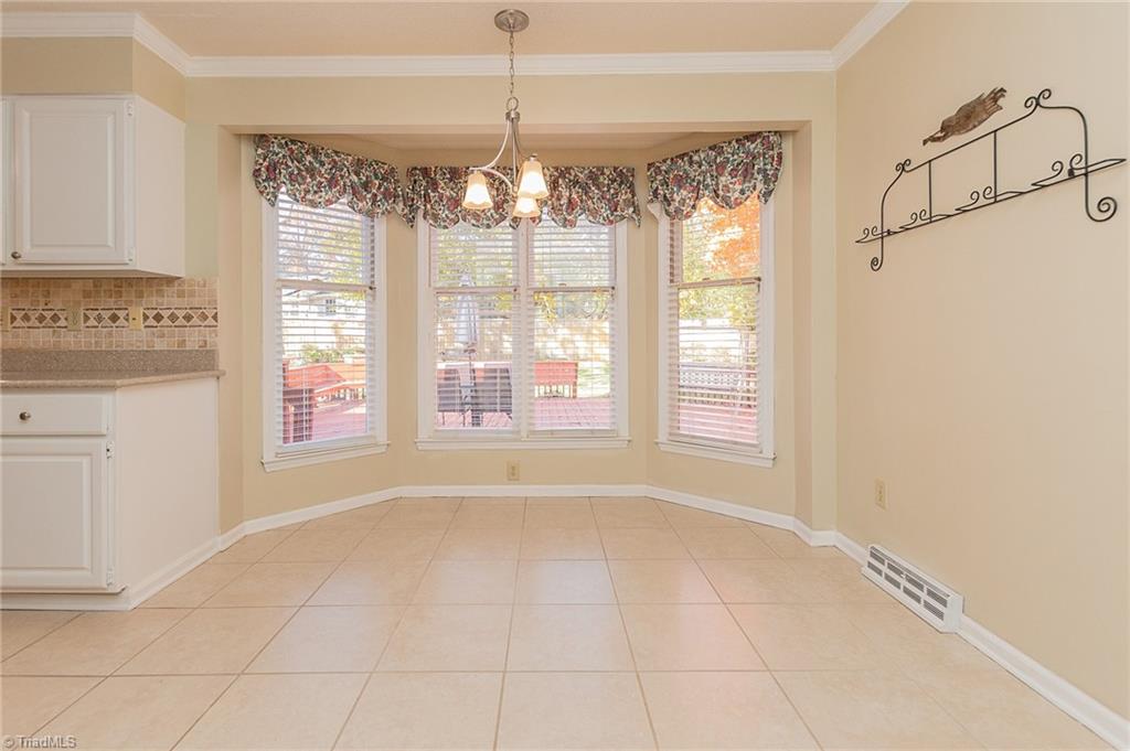 5414 Tower Road Greensboro, NC 27410 - Photo 17 of 45 Breakfast nook overlooking back yard
