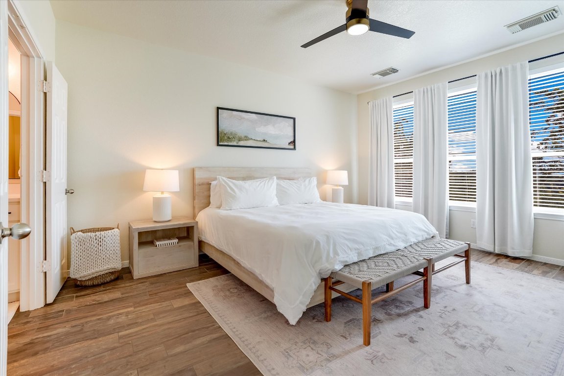 13201 North Ridge Circle Leander, TX 78641 - Photo 15 of 33 a bedroom with a bed and a large window