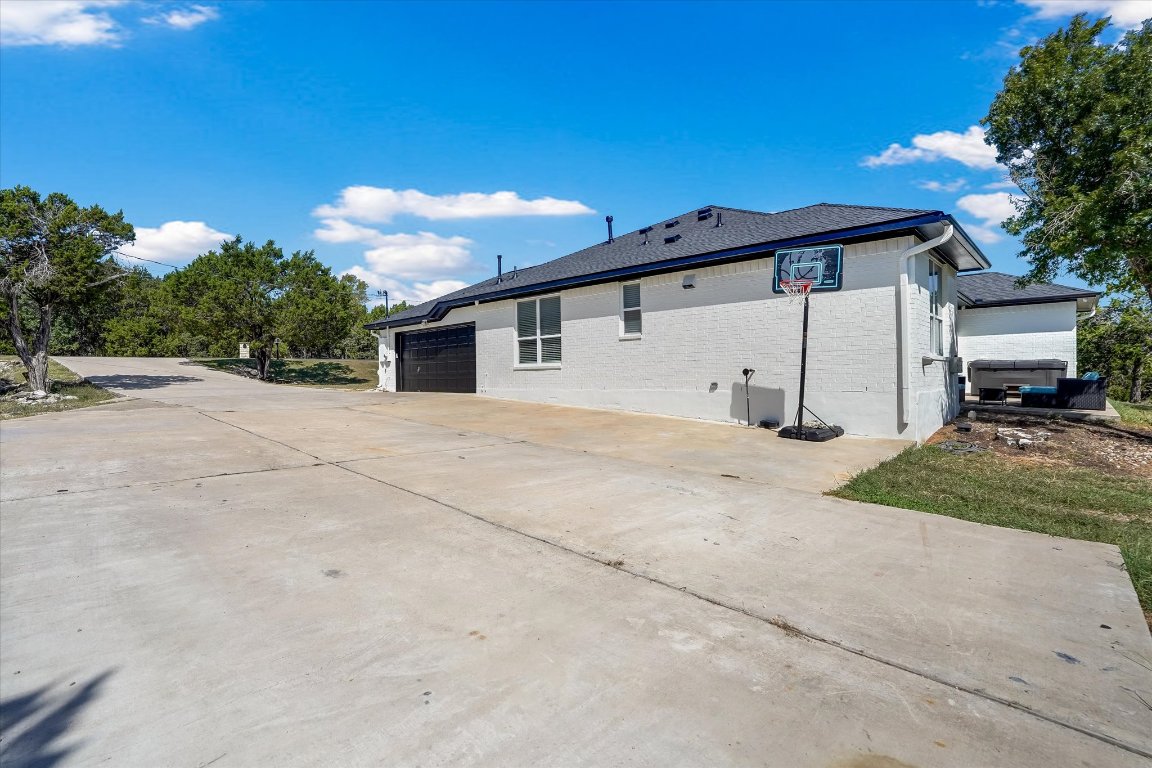 13201 North Ridge Circle Leander, TX 78641 - Photo 32 of 33 a view of a house with a yard