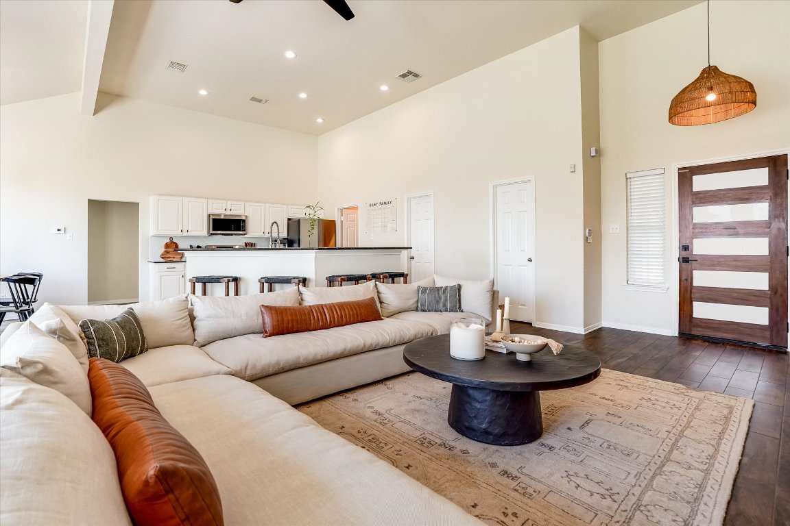 13201 North Ridge Circle Leander, TX 78641 - Photo 6 of 33 a living room with fireplace furniture and a wooden floor