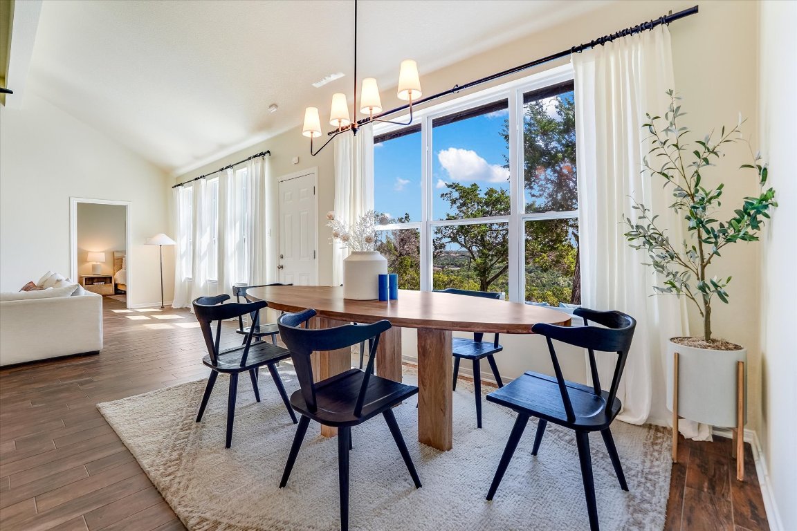 13201 North Ridge Circle Leander, TX 78641 - Photo 8 of 33 a view of a dining room with furniture window and wooden floor