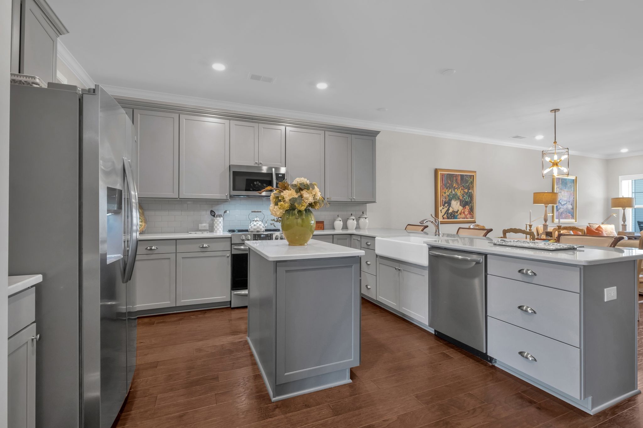 131 Calm Waters Street Franklin, TN 37064 - Photo 11 of 32 a kitchen with a sink refrigerator and cabinets