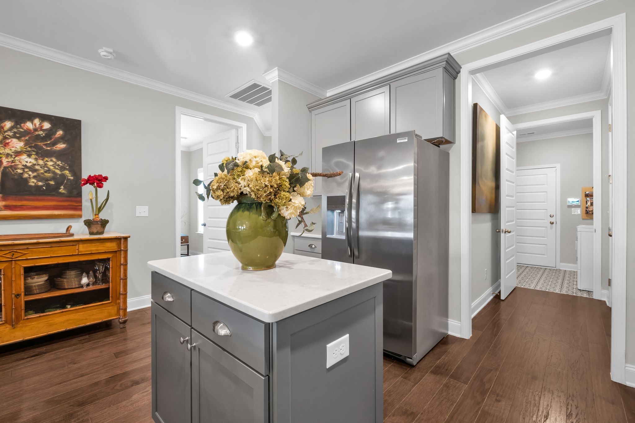 131 Calm Waters Street Franklin, TN 37064 - Photo 14 of 32 a kitchen with stainless steel appliances a refrigerator and a stove