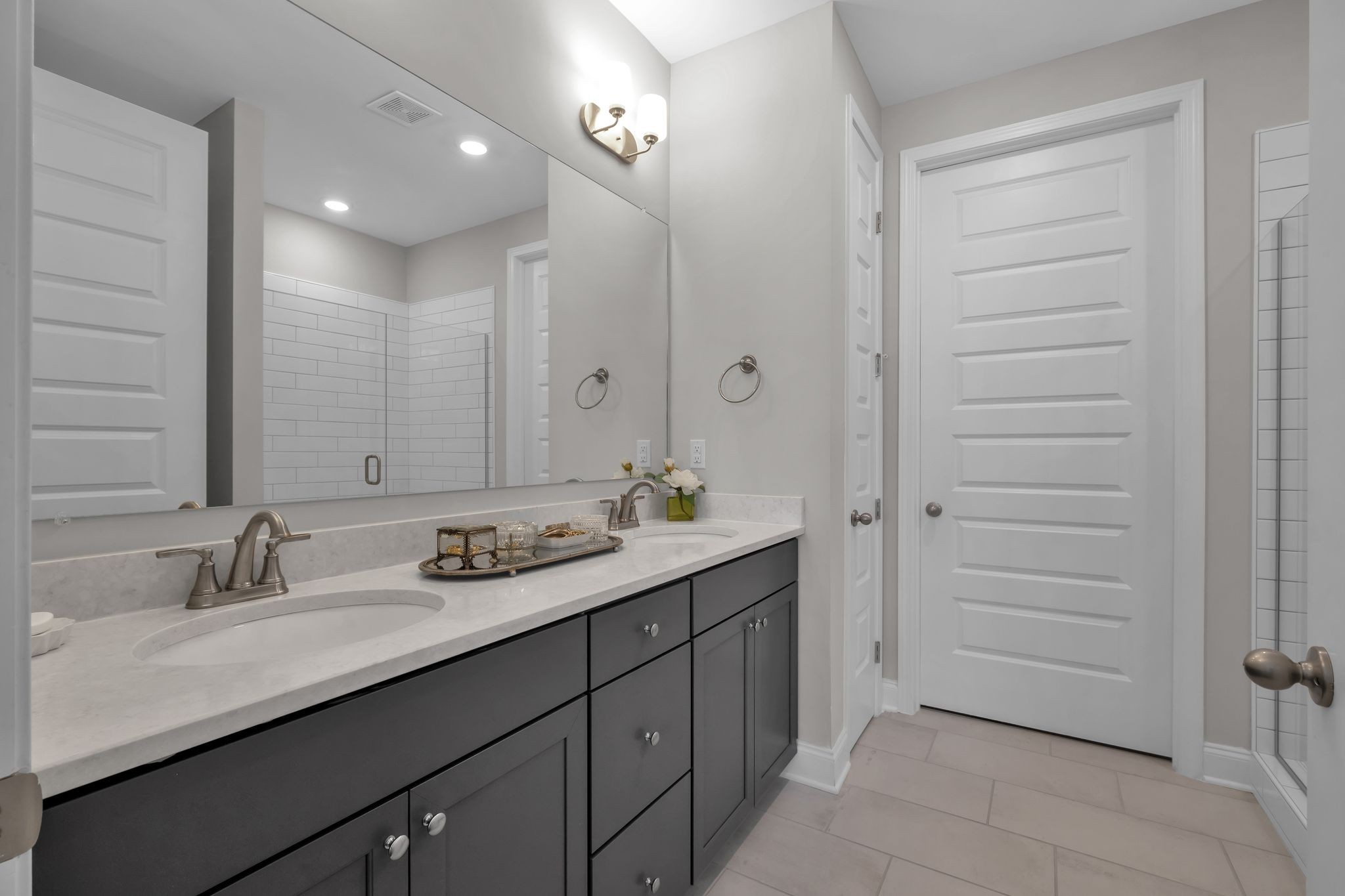 131 Calm Waters Street Franklin, TN 37064 - Photo 23 of 32 a bathroom with a sink and a mirror