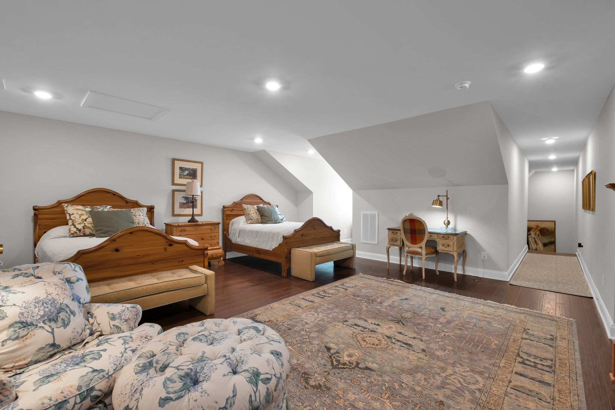 131 Calm Waters Street Franklin, TN 37064 - Photo 26 of 32 a bedroom with furniture and a chair