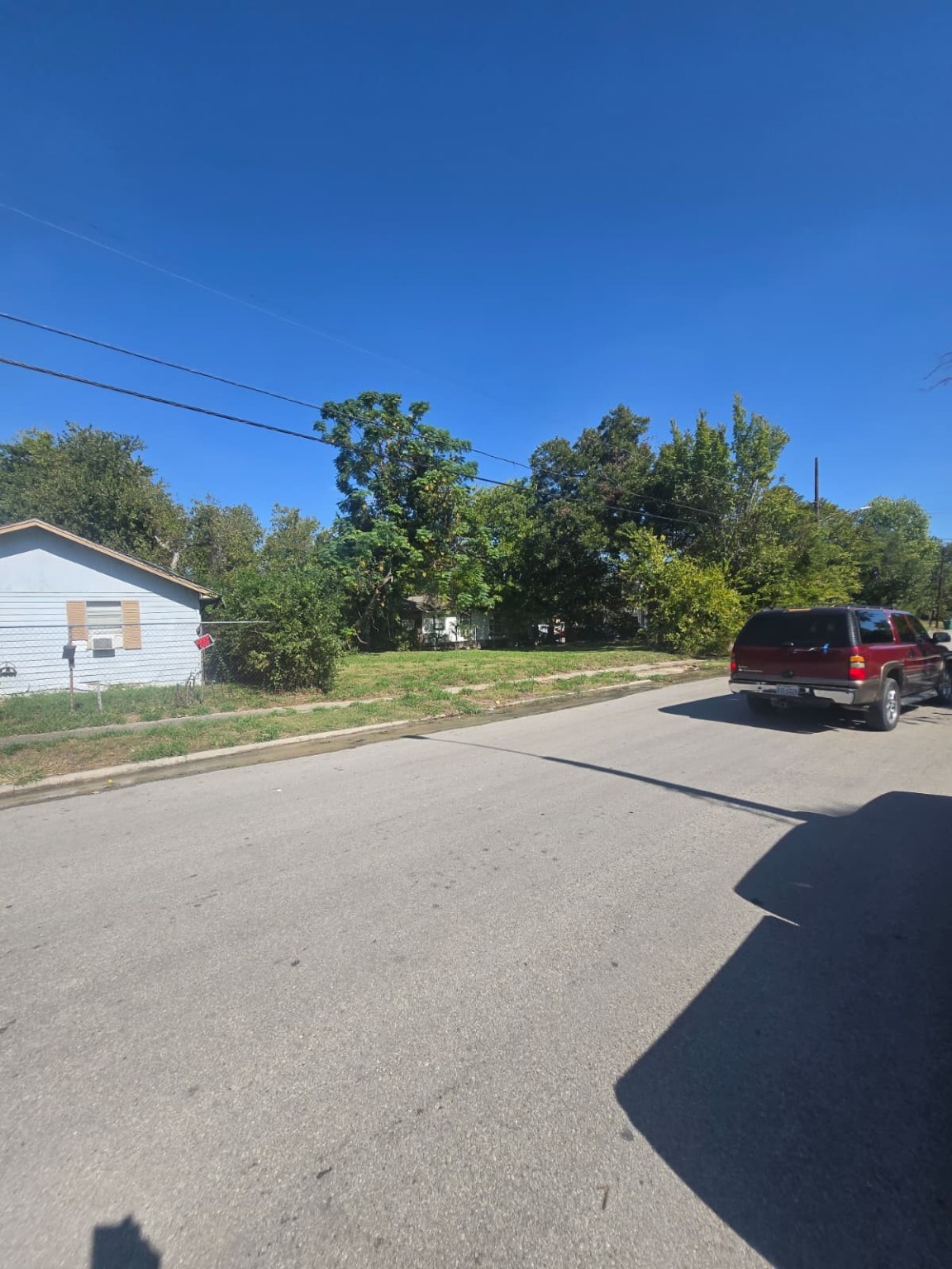3221 Drew Street Houston, TX 77004 - Photo 6 of 10 a car parked on the side of the road