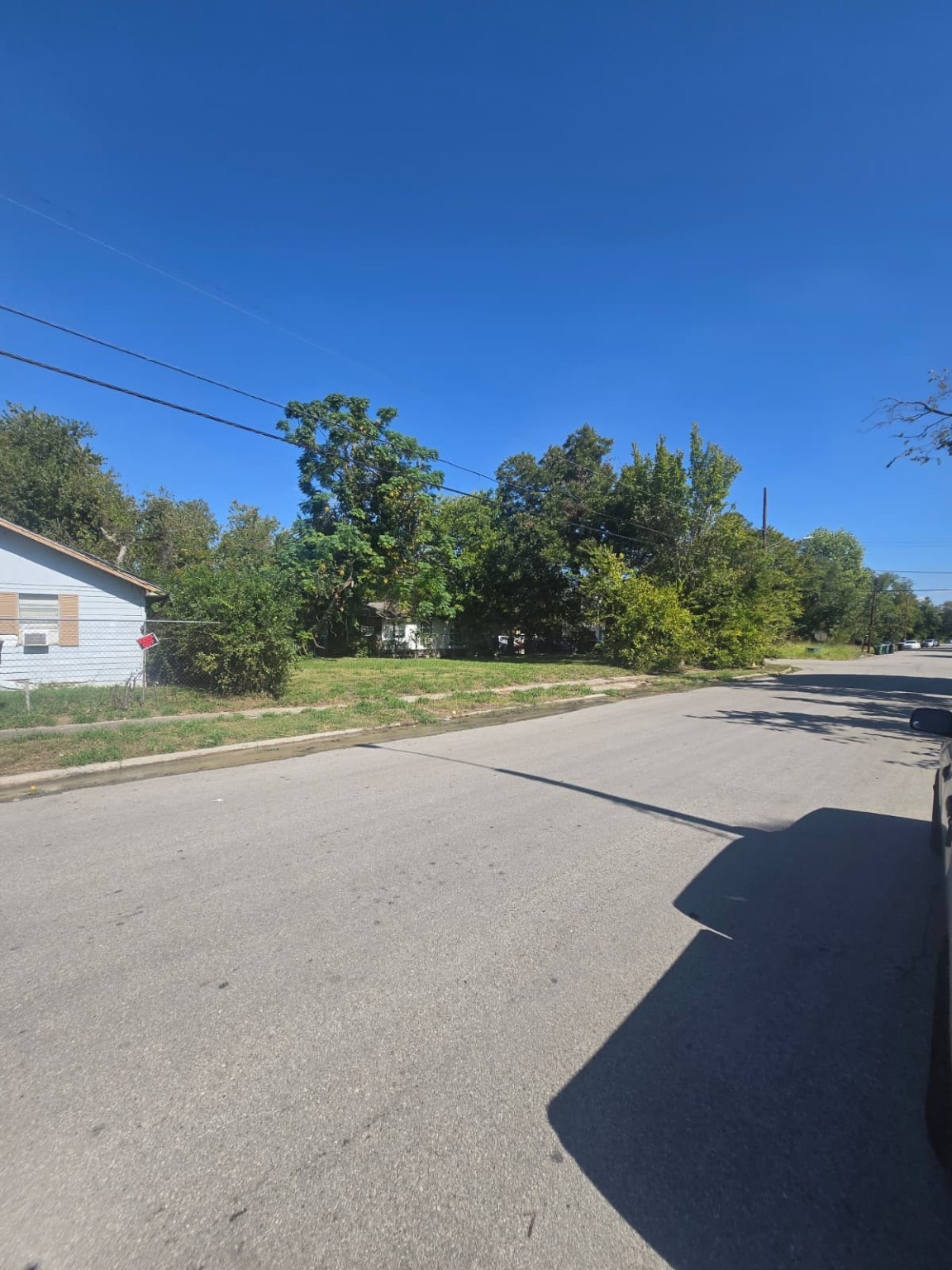3221 Drew Street Houston, TX 77004 - Photo 8 of 10 a view of a road with a building in the background