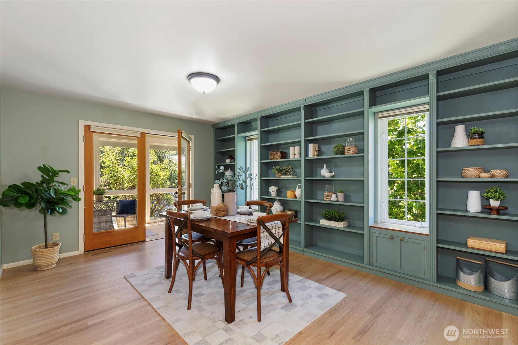 1757 Maple Street Port Townsend, WA 98368 - Photo 12 of 40 a view of a dining room with furniture window and wooden floor