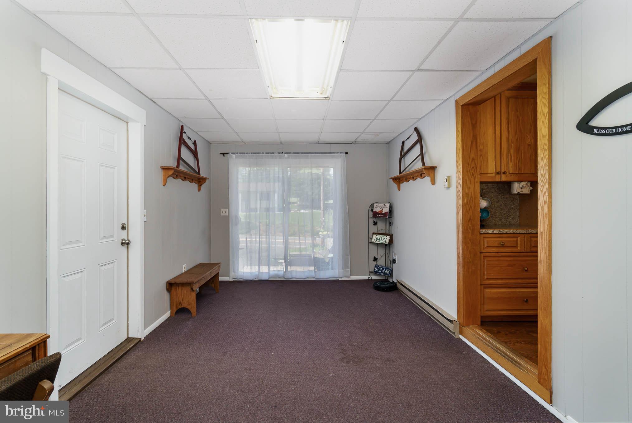 329 Seven Stars Road Millerstown, PA 17062 - Photo 11 of 22 Mudroom/Breezeway to keep all the shoes & bags