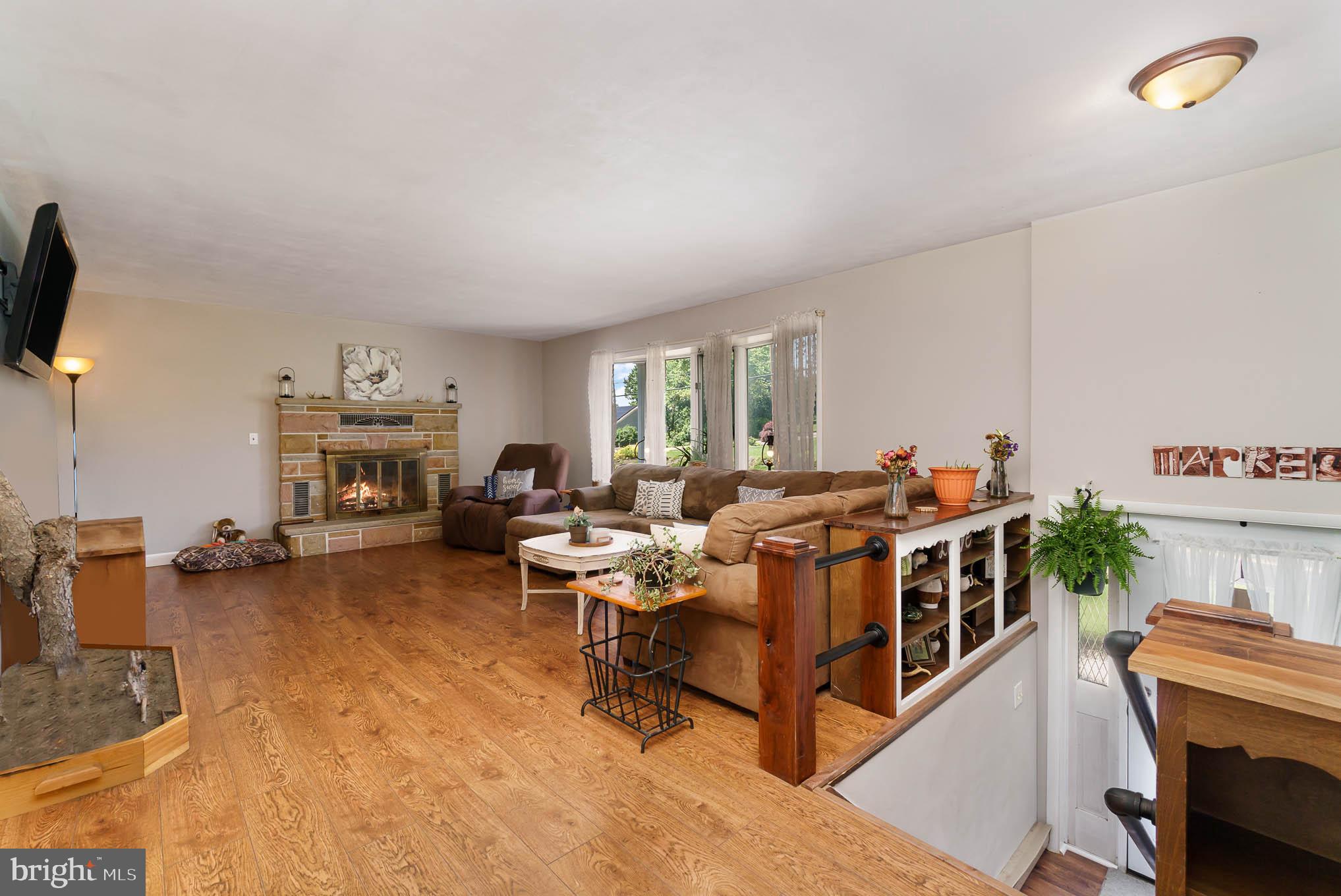 329 Seven Stars Road Millerstown, PA 17062 - Photo 5 of 22 Cozy up to the fireplace in the Livingroom
