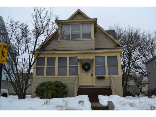 159 Alfred Street Bridgeport, CT 06605 - Photo 1 of 1 a front view of a house with garden