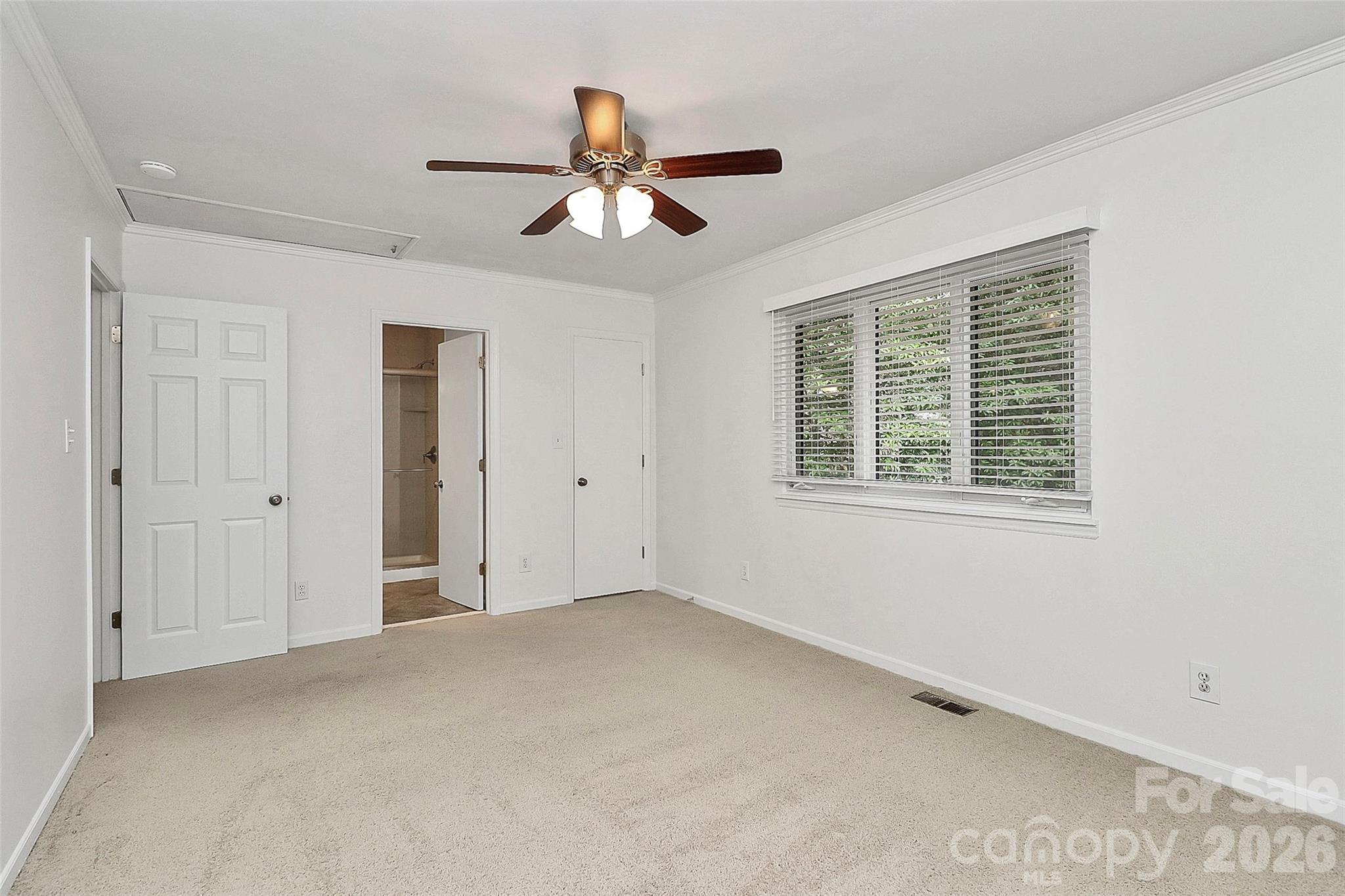 9421 Fairway Ridge Road Charlotte, NC 28277 - Photo 17 of 36 a view of an empty room with a window