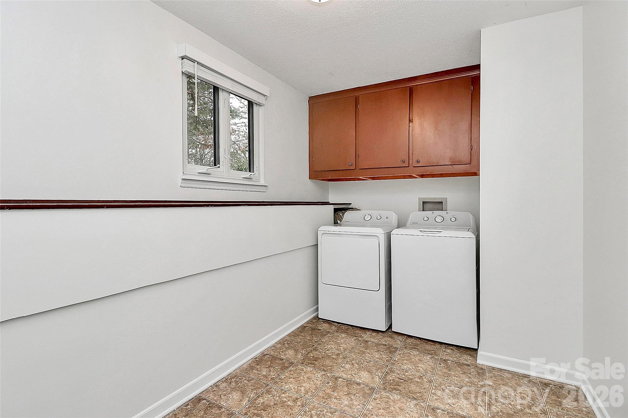 9421 Fairway Ridge Road Charlotte, NC 28277 - Photo 27 of 36 a utility room with dryer and washer