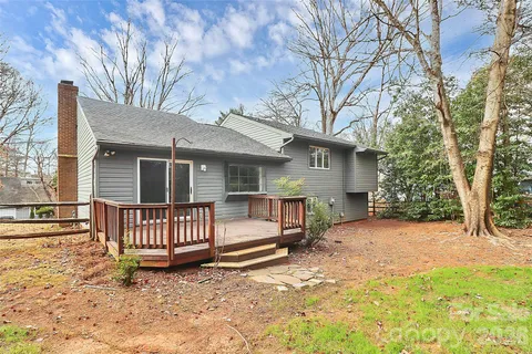 a house with trees in front of it