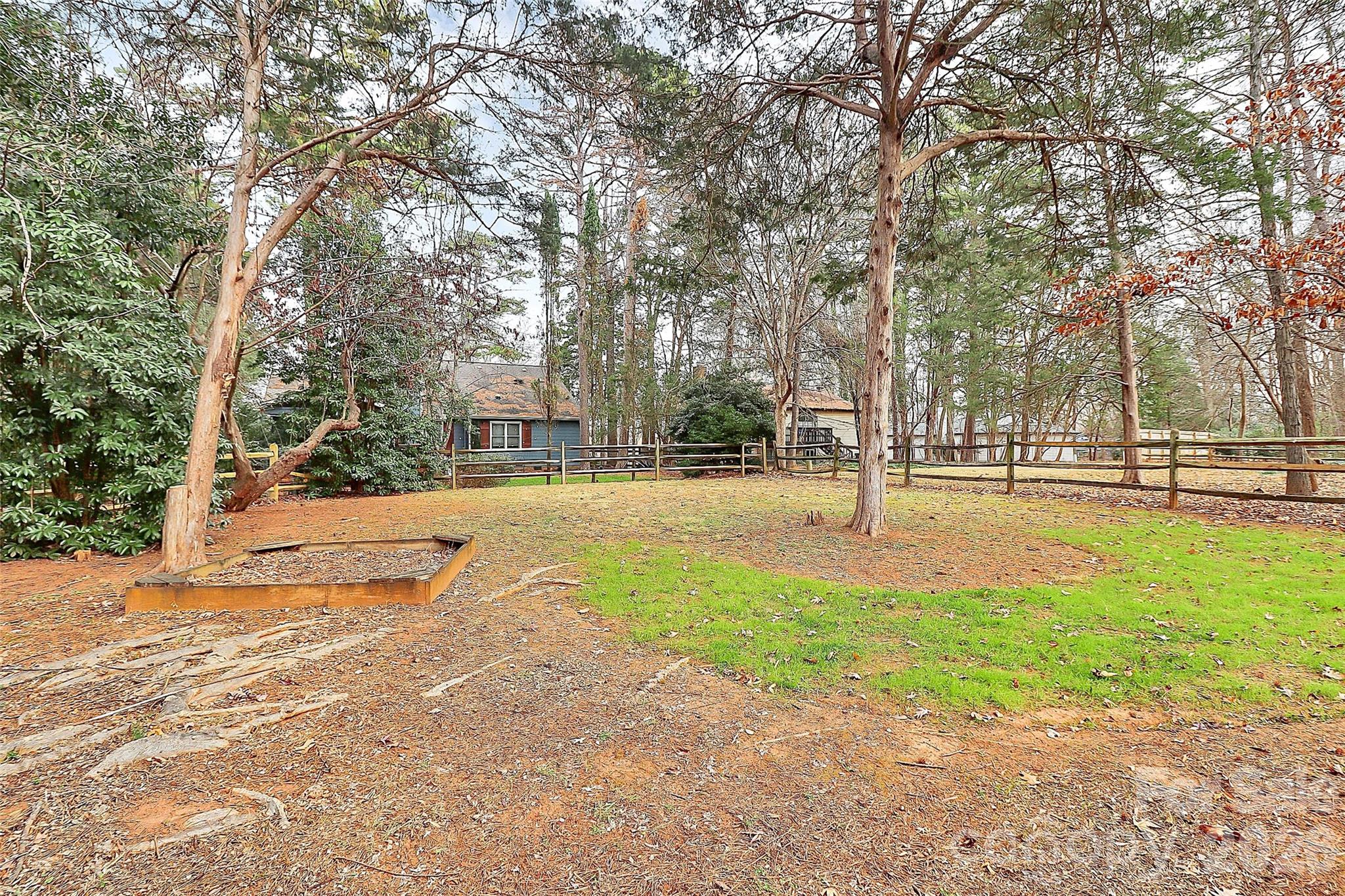 9421 Fairway Ridge Road Charlotte, NC 28277 - Photo 35 of 36 a building with trees in front of it