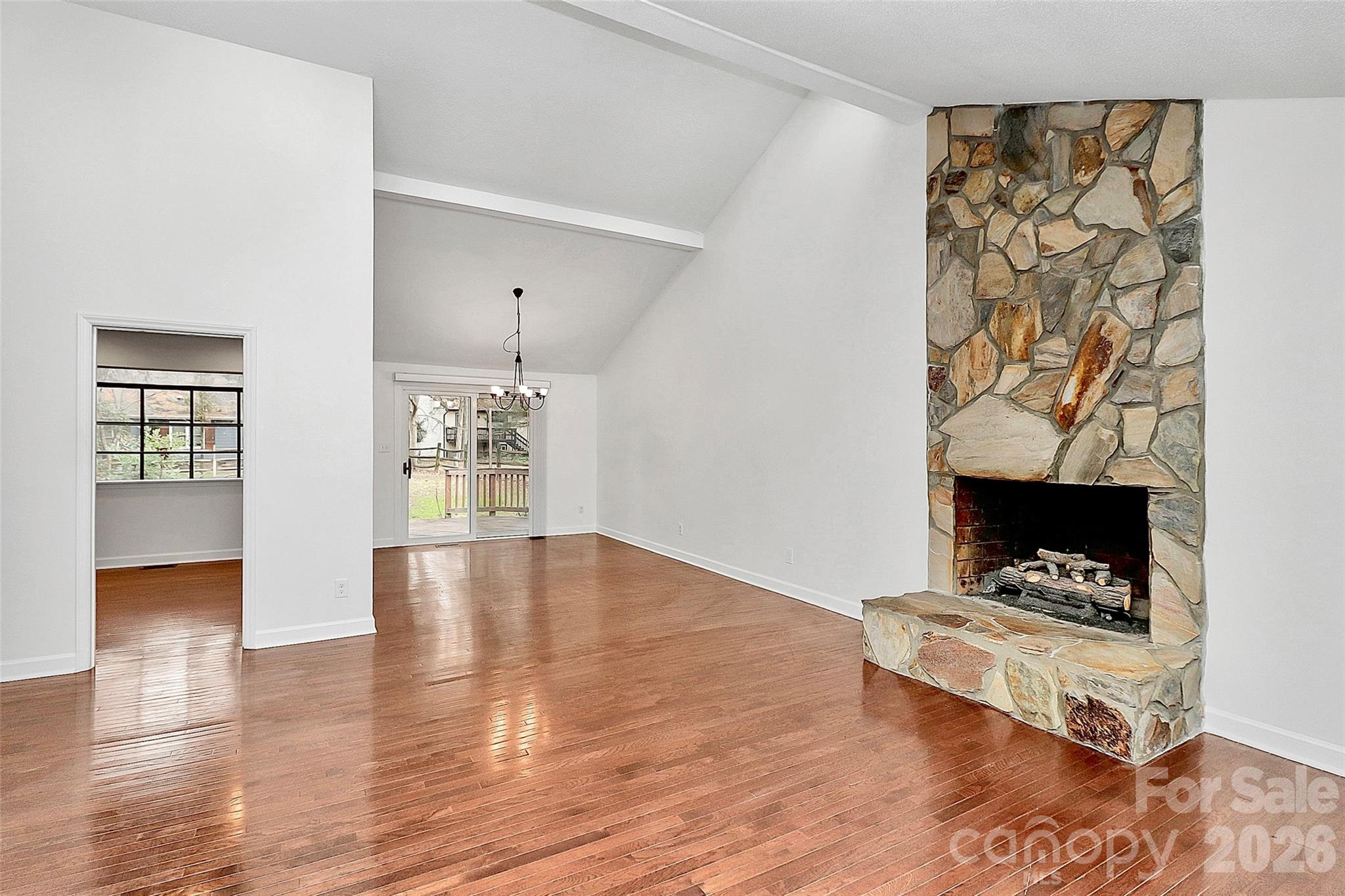 9421 Fairway Ridge Road Charlotte, NC 28277 - Photo 5 of 36 a living room with furniture and a fireplace