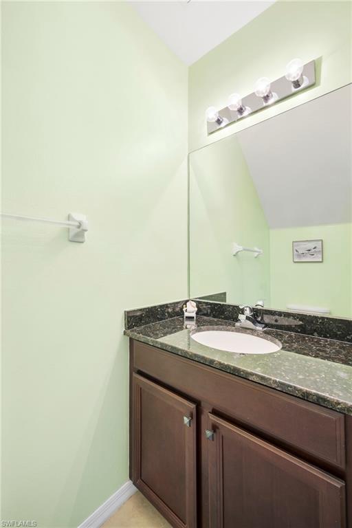 3916 Cherrybrook Loop Fort Myers, FL 33966 - Photo 10 of 31 Downstairs half bath