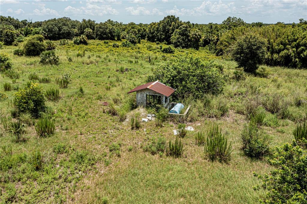 Southwest Hull Avenue Fort Ogden, FL 34267 - Photo 26 of 36 a view of a lake with a house in the background