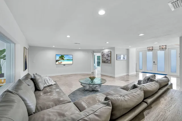 a living room with furniture and a couch