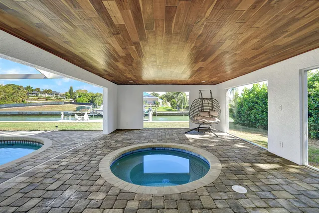 a very nice looking rest room with a large window