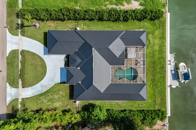 an aerial view of a house with a garden