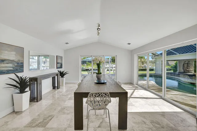 a view of a livingroom with furniture window and wooden floor