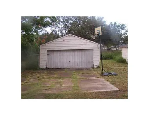 a black and white photo of a house