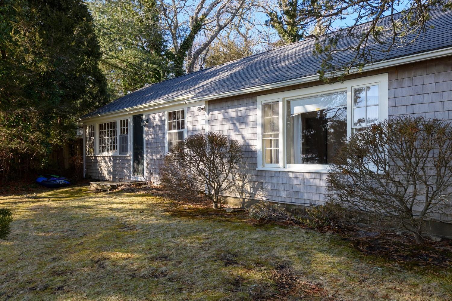 16 Lakeview Drive Centerville, MA 02632 - Photo 13 of 34 a view of a house with backyard and garden