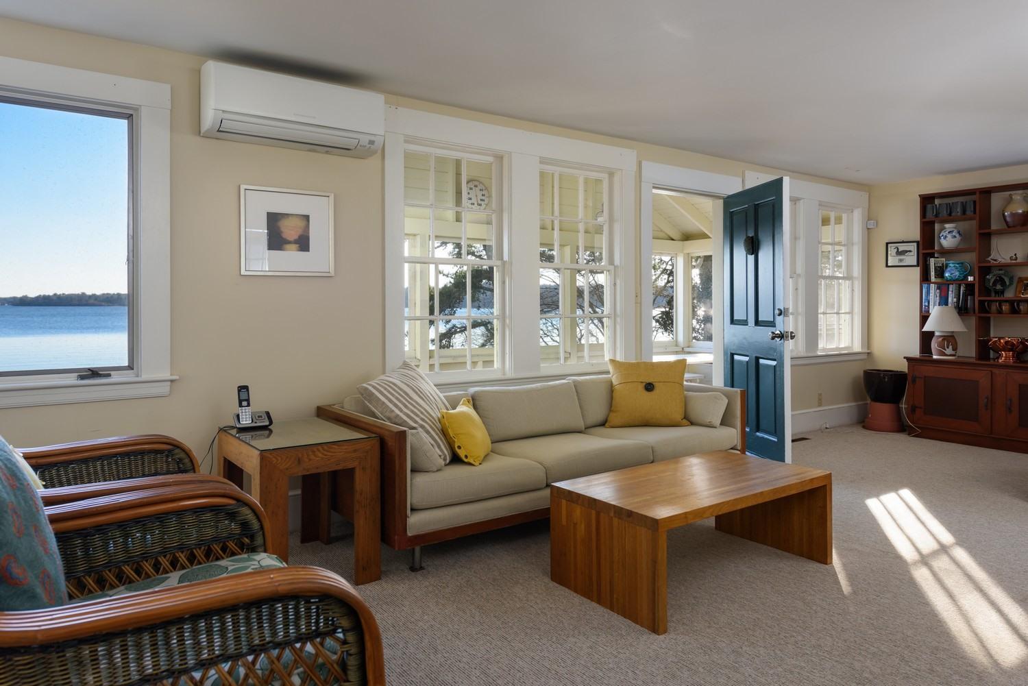 16 Lakeview Drive Centerville, MA 02632 - Photo 18 of 34 a living room with furniture and a window