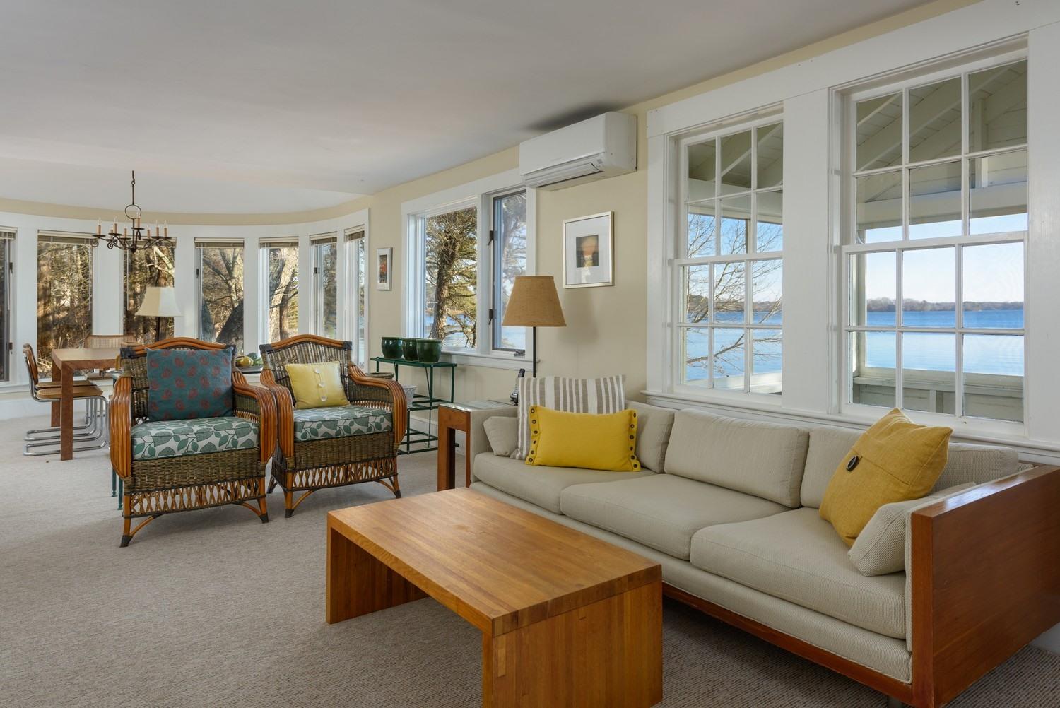 16 Lakeview Drive Centerville, MA 02632 - Photo 20 of 34 a living room with furniture and a large window