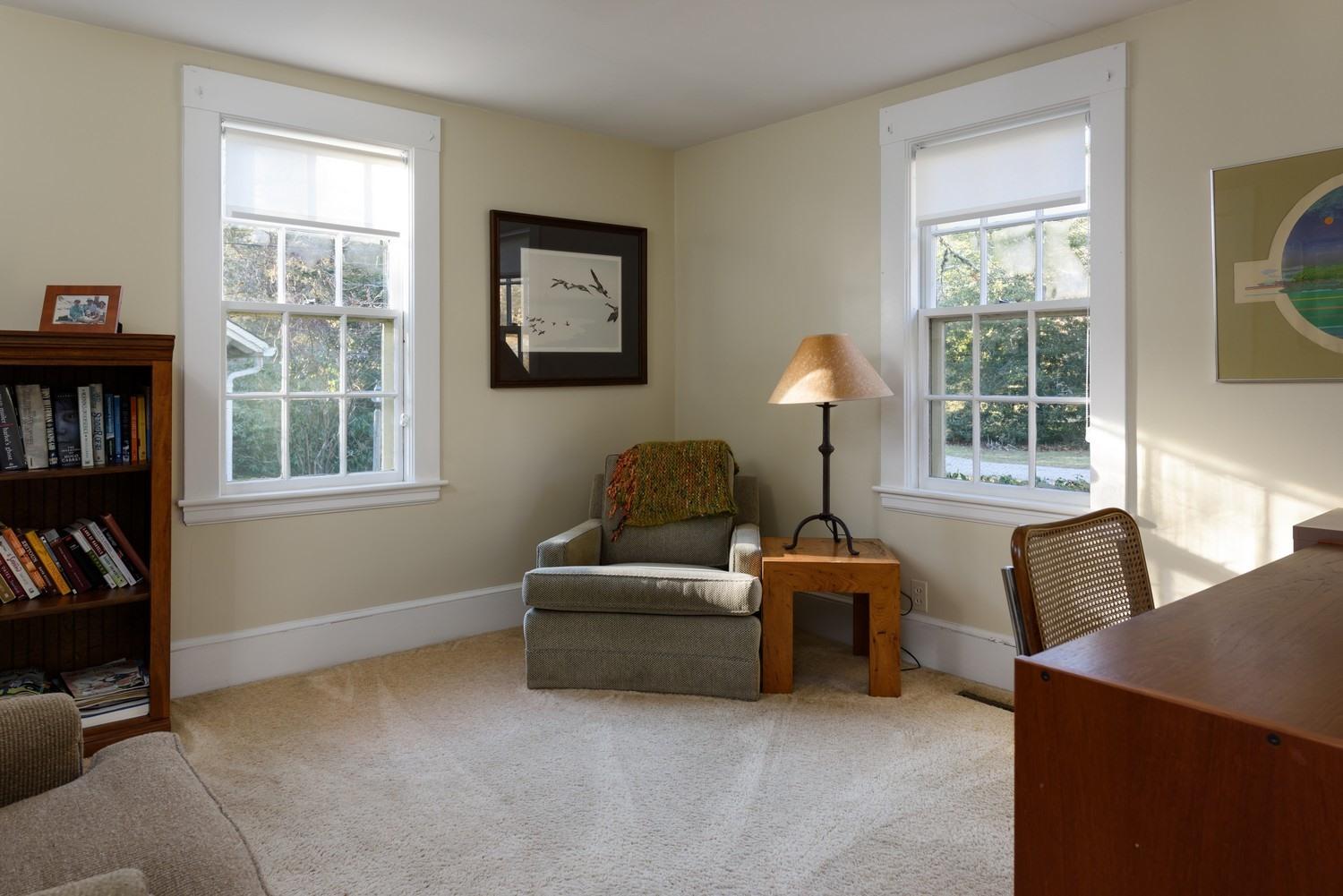 16 Lakeview Drive Centerville, MA 02632 - Photo 26 of 34 a living room with furniture and a window