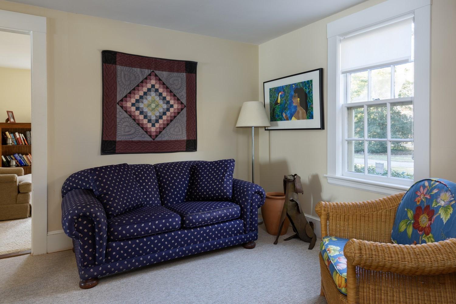 16 Lakeview Drive Centerville, MA 02632 - Photo 27 of 34 a living room with furniture and a window