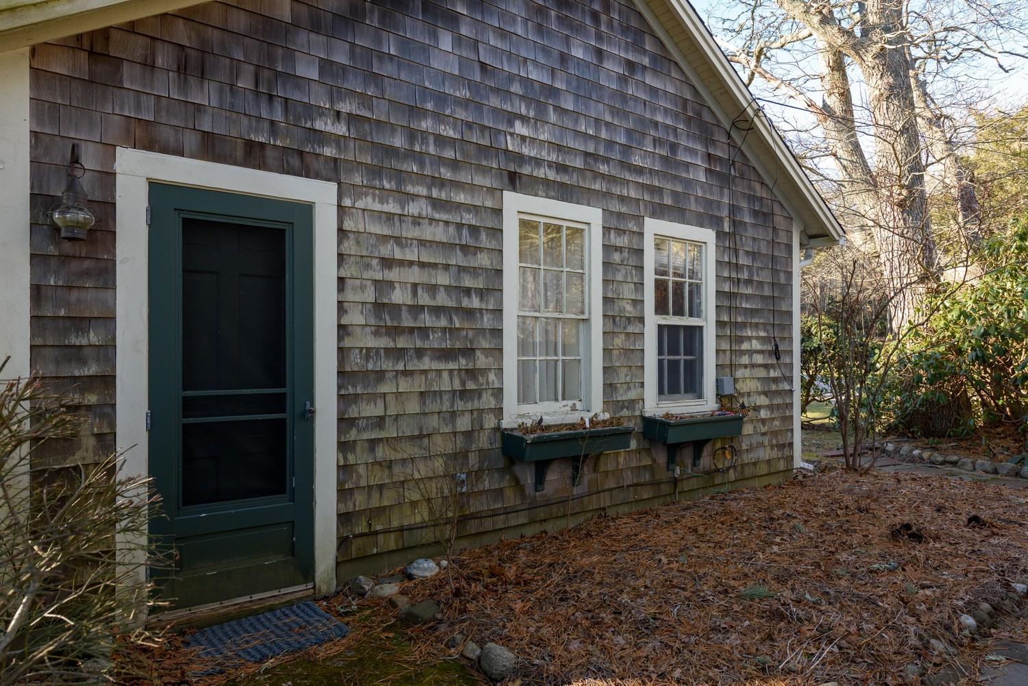 16 Lakeview Drive Centerville, MA 02632 - Photo 28 of 34 a front view of a house with a yard