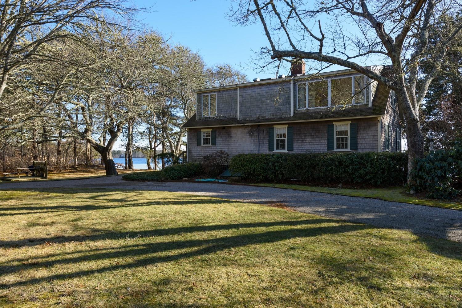 16 Lakeview Drive Centerville, MA 02632 - Photo 6 of 34 a view of a house with a yard