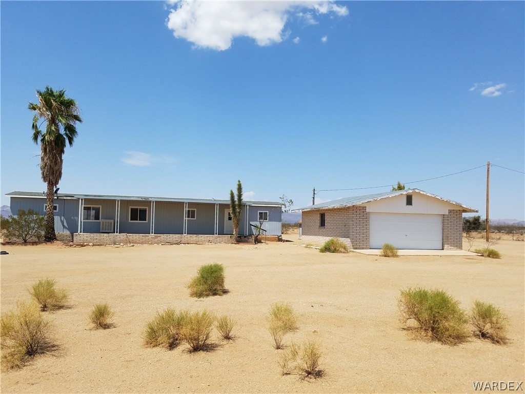3645 Ligurta Road Golden Valley, AZ 86413 - Photo 1 of 17 Front view of subject property