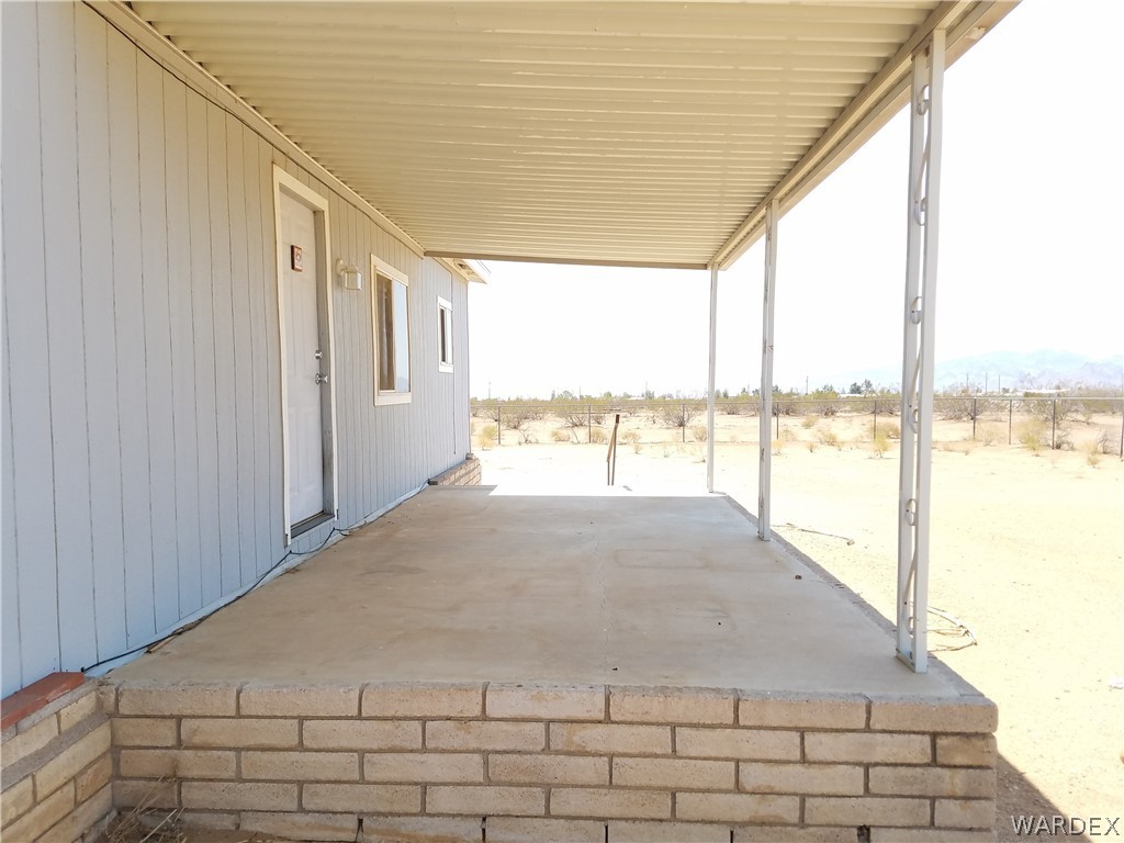 3645 Ligurta Road Golden Valley, AZ 86413 - Photo 16 of 17 Rear covered porch