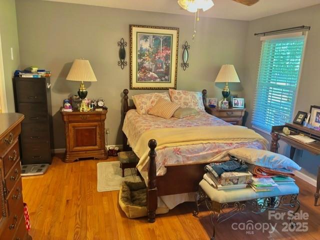 912 Redwood Lane Chester, SC 29706 - Photo 17 of 31 a bed room with a bed and a chair