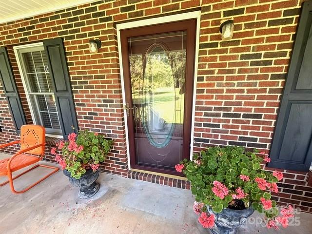 912 Redwood Lane Chester, SC 29706 - Photo 2 of 31 a potted plant sitting in front of a house