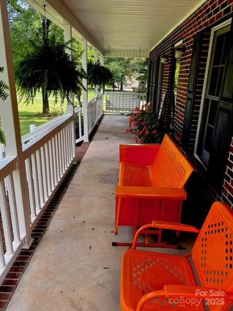 912 Redwood Lane Chester, SC 29706 - Photo 24 of 31 a view of balcony with wooden floor and outdoor seating