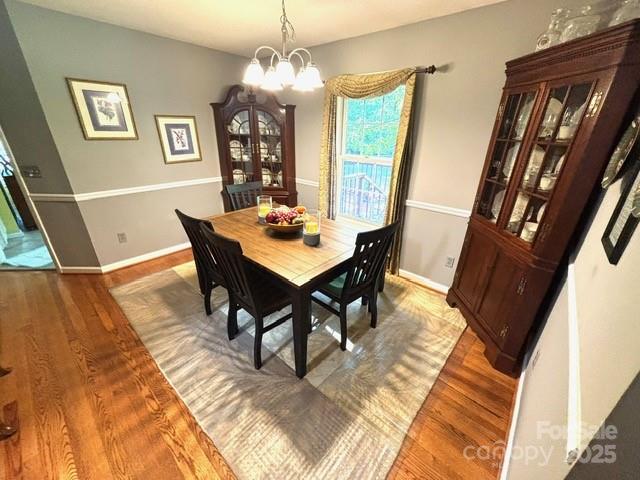 912 Redwood Lane Chester, SC 29706 - Photo 9 of 31 a view of a dining room with furniture and wooden floor