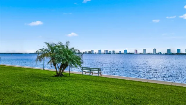 a bathroom with a shower and a glass door shower