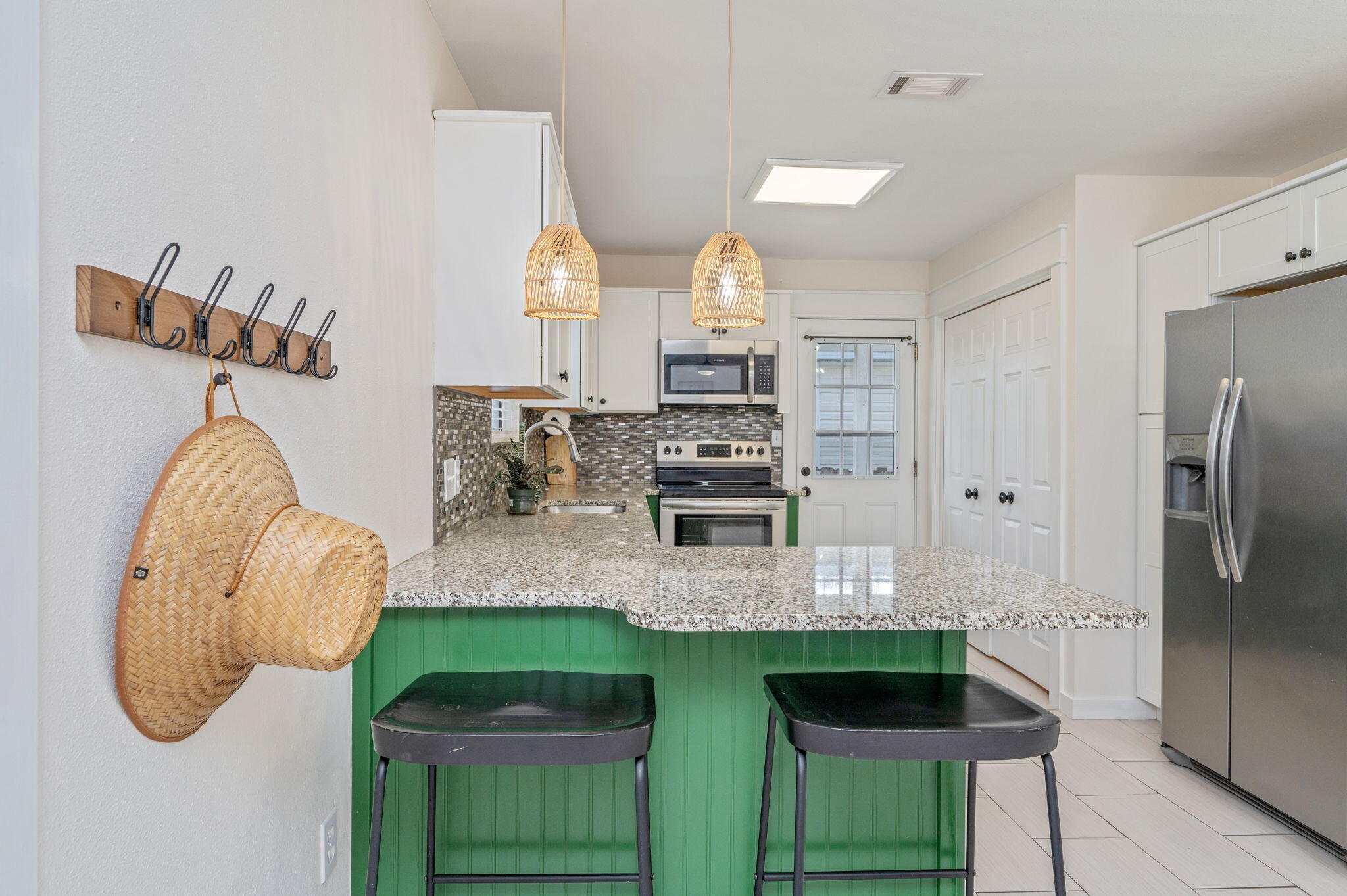5816 Jack Stokes Road Baker, FL 32531 - Photo 6 of 16 a bathroom with a sink a mirror and shower