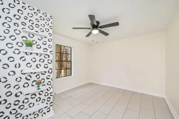 a view of an empty room and window