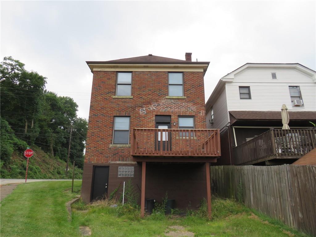 800 Liberty Street McKees Rocks, PA 15136 - Photo 36 of 36 a front view of a house with a garden and plants