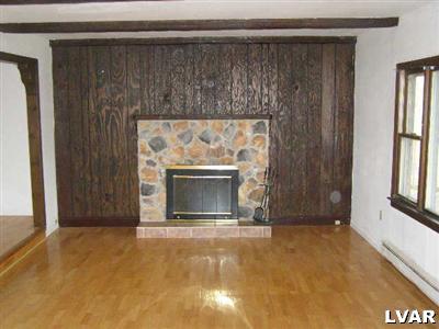 3025 Funks Mill Road Riegelsville, PA 18077 - Photo 2 of 5 a view of an empty room with a fireplace