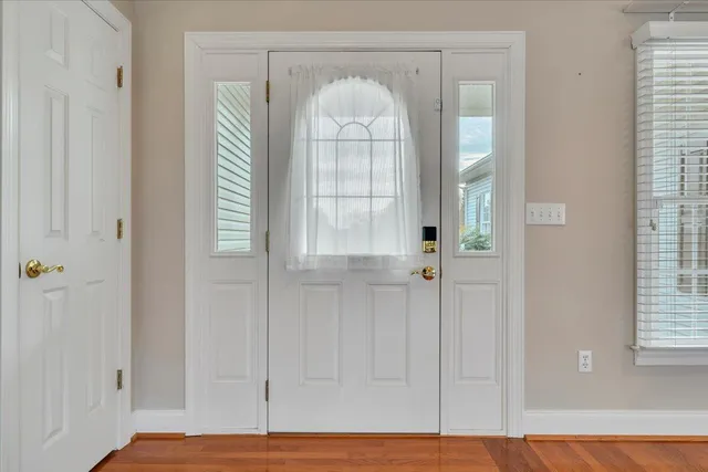 a kitchen with a sink and a stove top oven